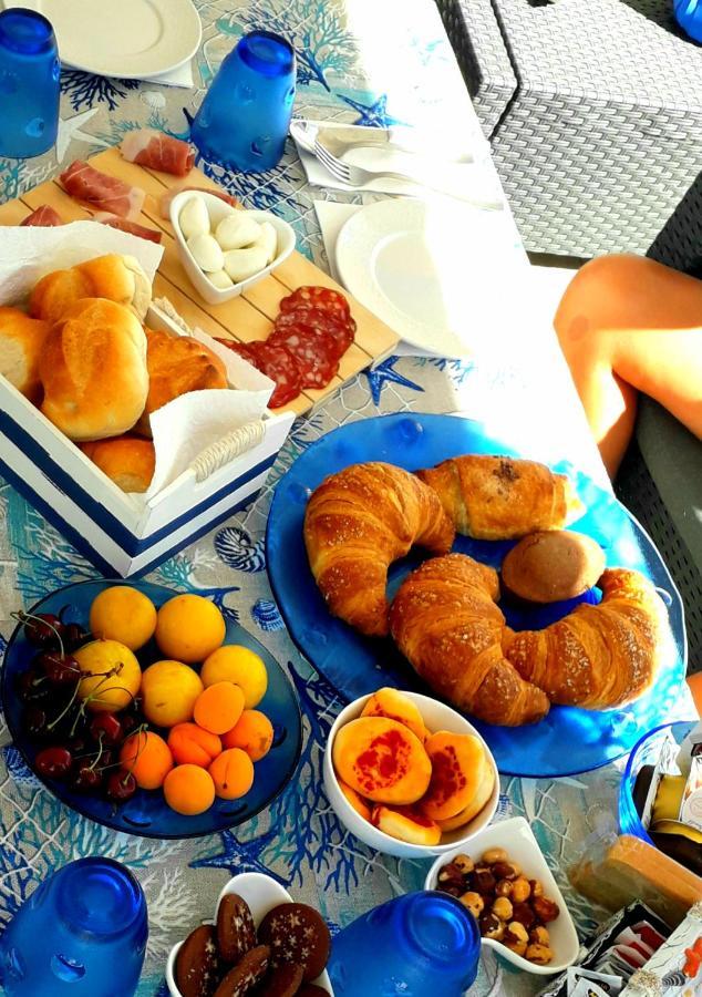 Joshua Rooms Porto Cesareo Bagian luar foto