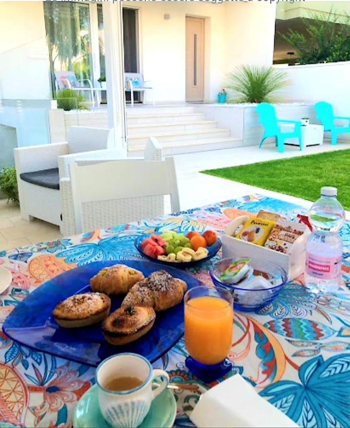 Joshua Rooms Porto Cesareo Bagian luar foto